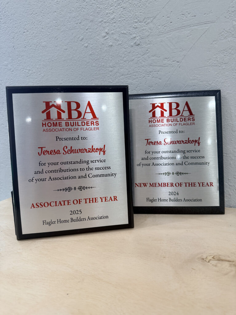 Home Builders Association of Flagler award plaques presented to Teresa Schwarzkopf